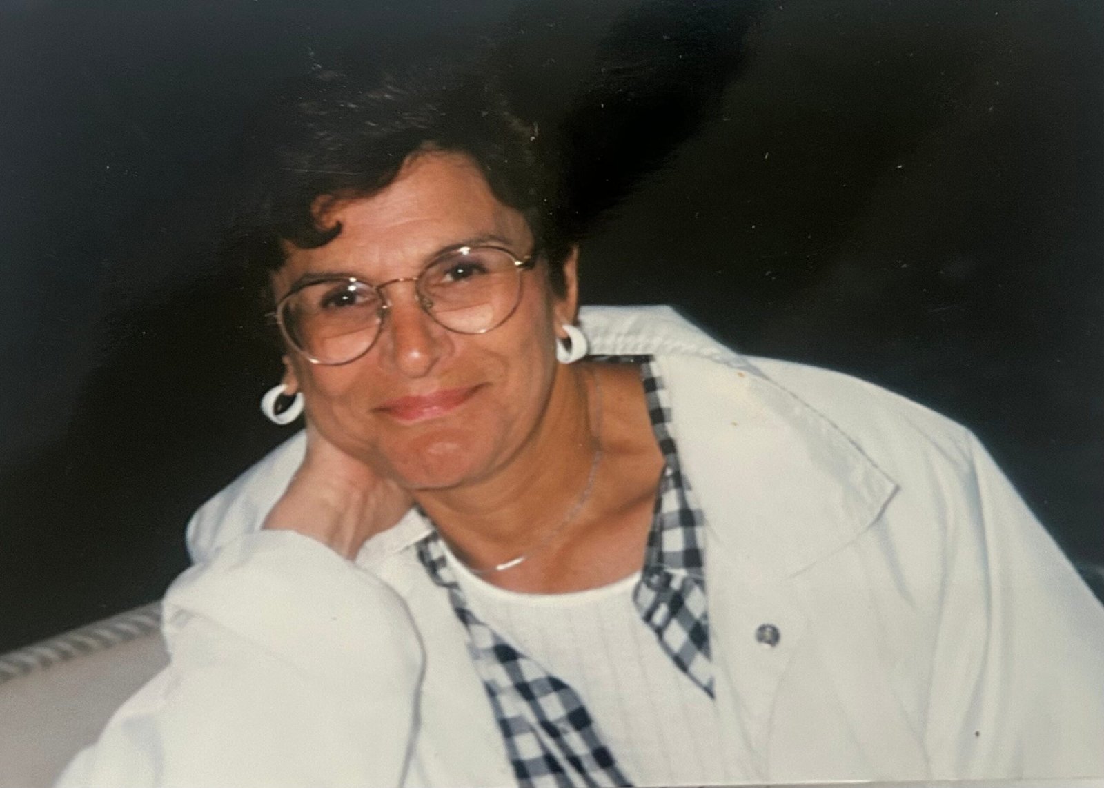 Woman posing for photo in the 80s