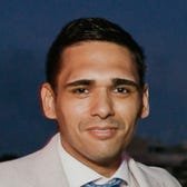 Theron Mohamed — Profile Picture