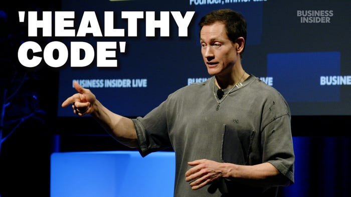 Bryan Johnson stands on stage at Business Insider's live event, The Long Play